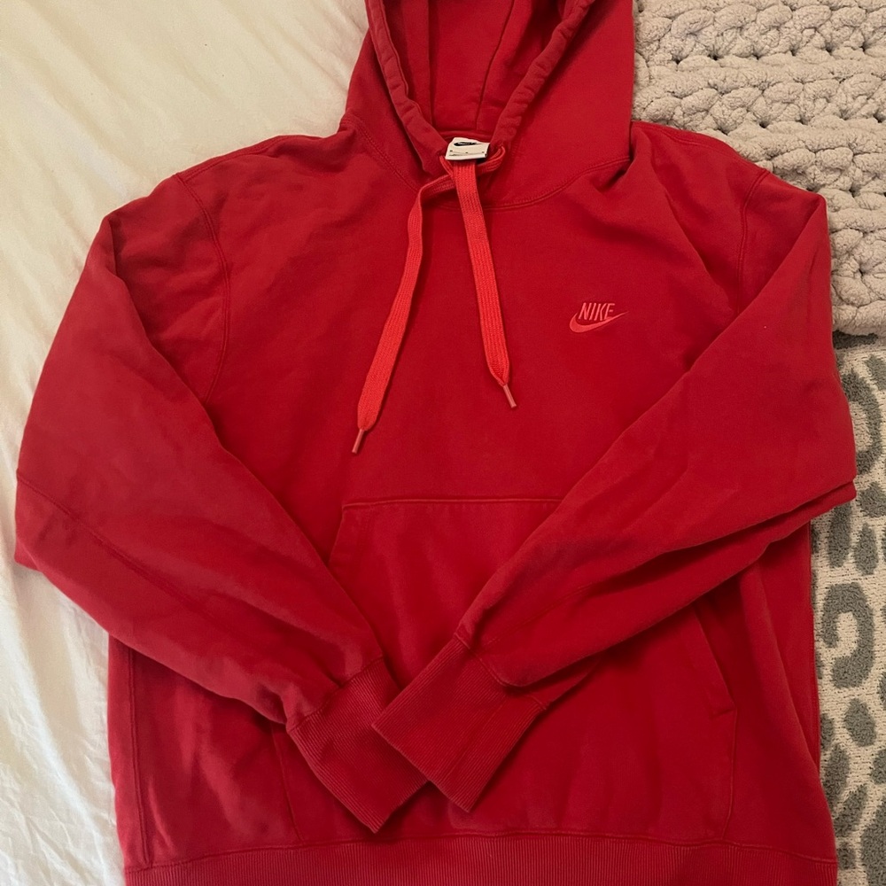 Bright orange Nike hoodie